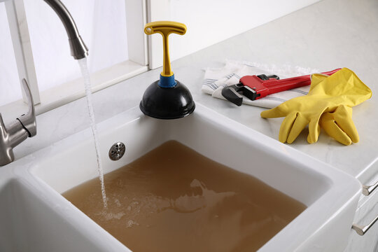 Xceed Plumbing clearing blocked drain in Sydney
